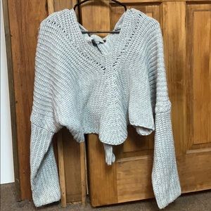 back tie gray cropped sweater with scalloped hem